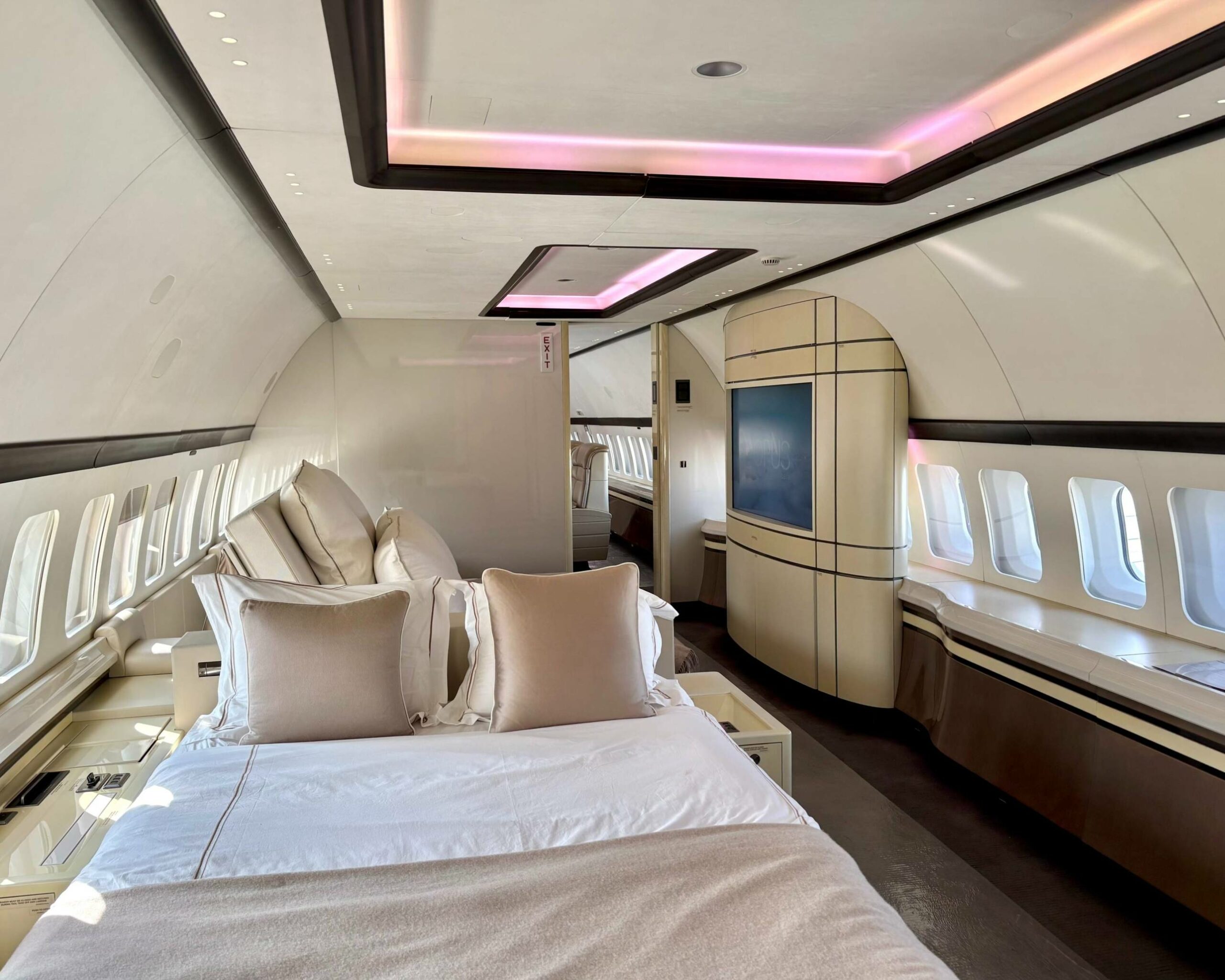 The master bedroom of this bbj has a large lounge & cinema area, followed by a double bed and bathroom with shower