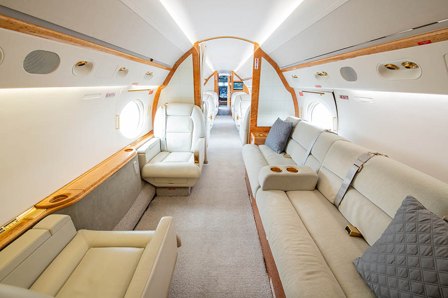 The Gulfstream V, developed by Gulfstream Aerospace, is a spacious, long-range business jet that evolved from the earlier Gulfstream IV model.